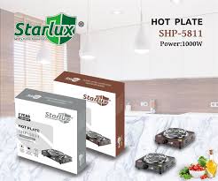 Réchaud électrique STARLUX 1000W à une plaque pour préparer du thé et de l'eau.